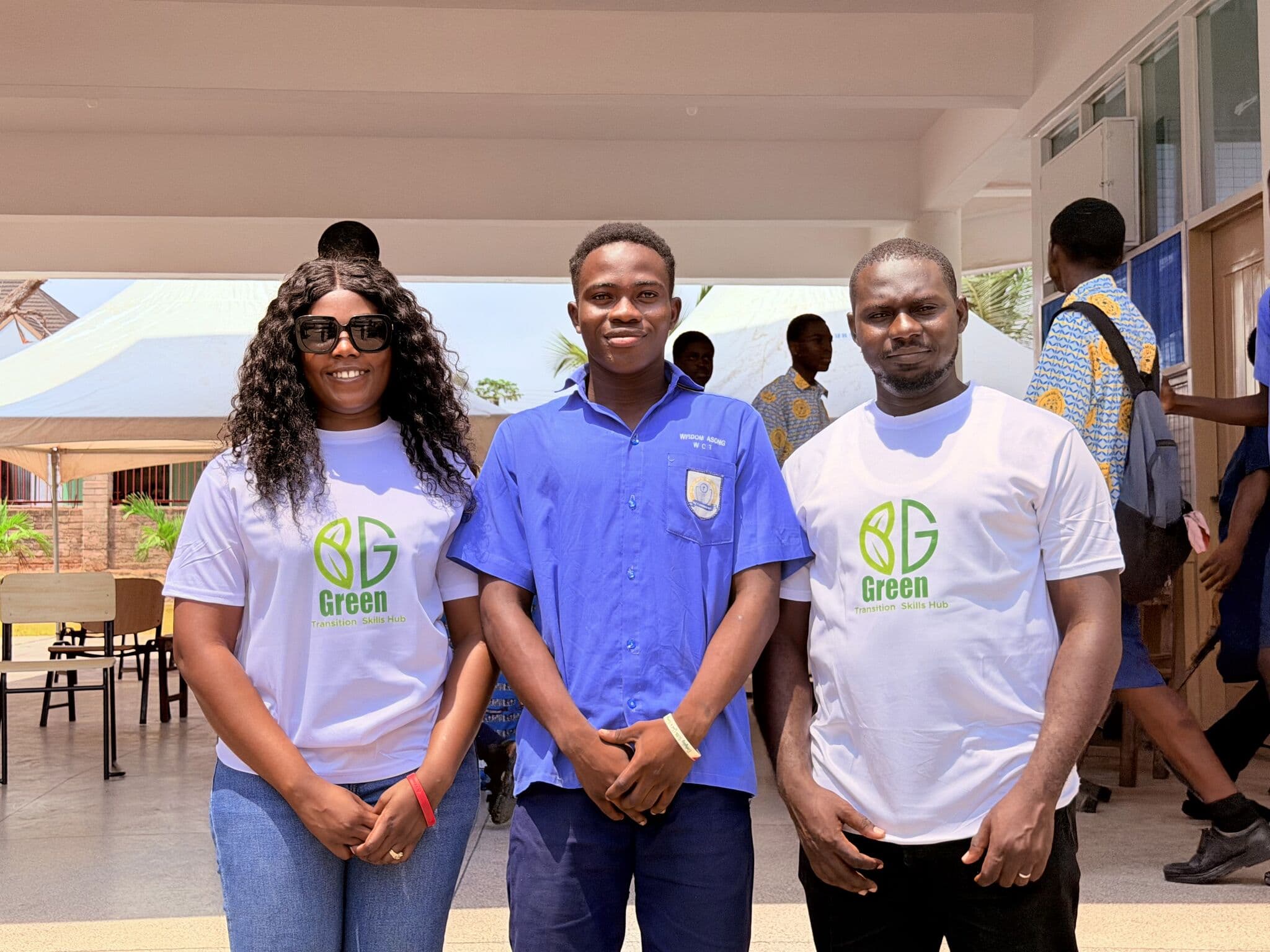 GTS Hub team members with student at outreach